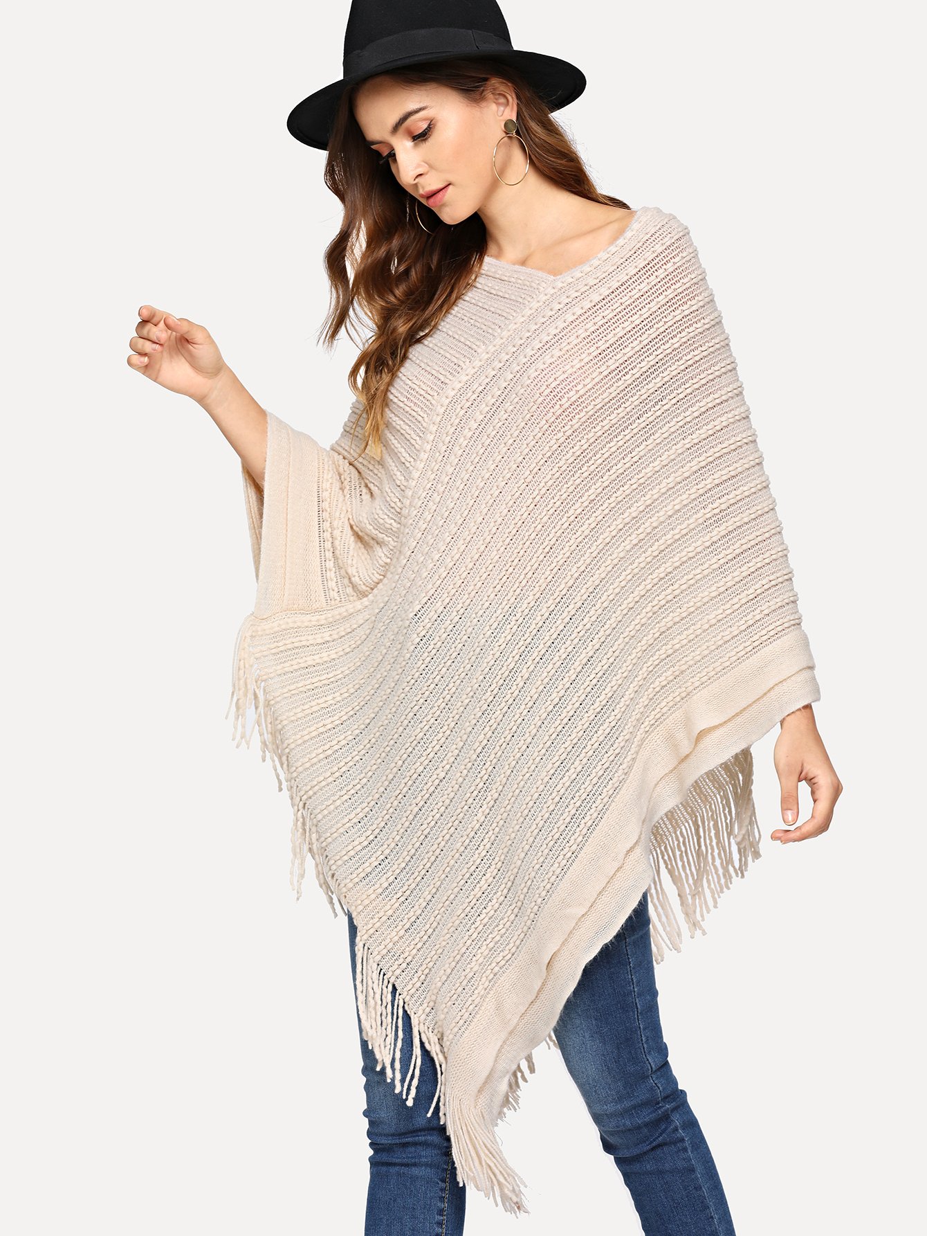Пончо с асимметричным низом с бахромой