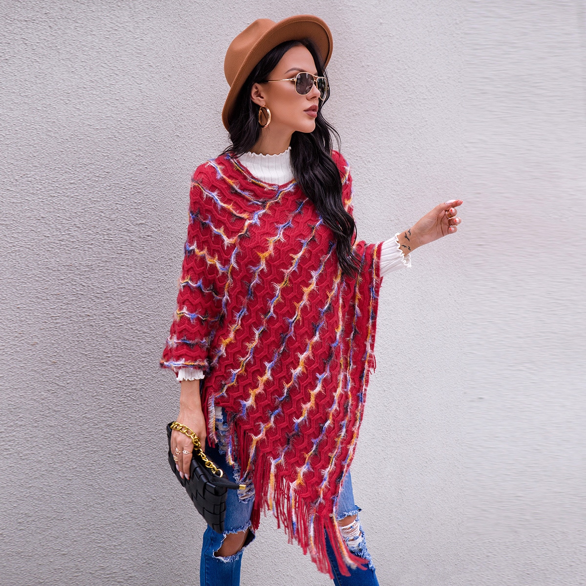 Асимметричное пончо с бахромой