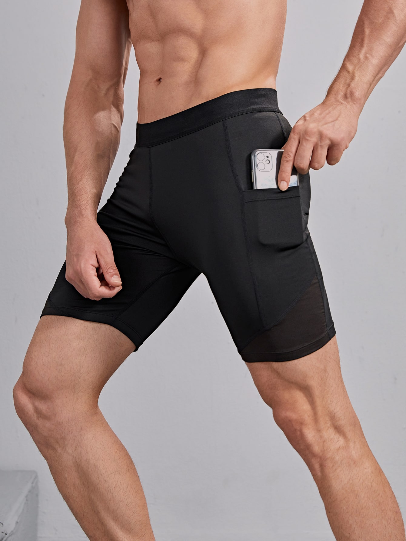 Men Solid Sports Shorts & Phone Pocket