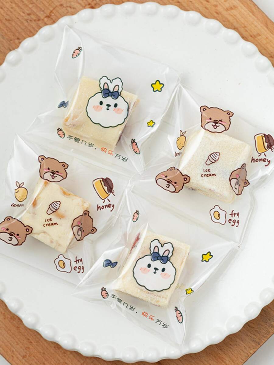 100 pièces Sachet de bonbons en plastique auto-adhésif, sac décoratif jetable avec graphique de dessin animé mignon pour les amoureux de la pâtisserie, sacs cadeaux pour fête de mariage