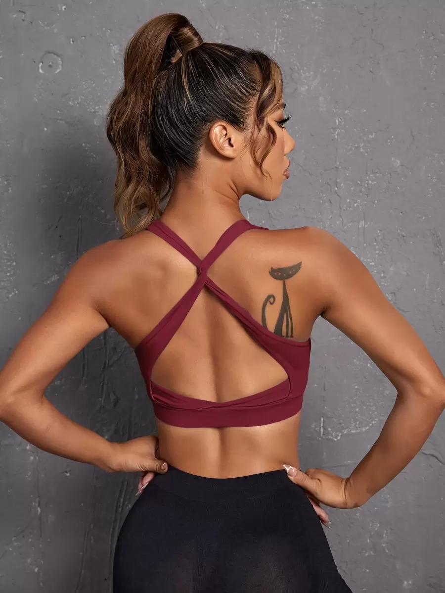 SHEIN Sport Studio Sujetador deportivo soporte ligero con tira cruzada de espalda abierta