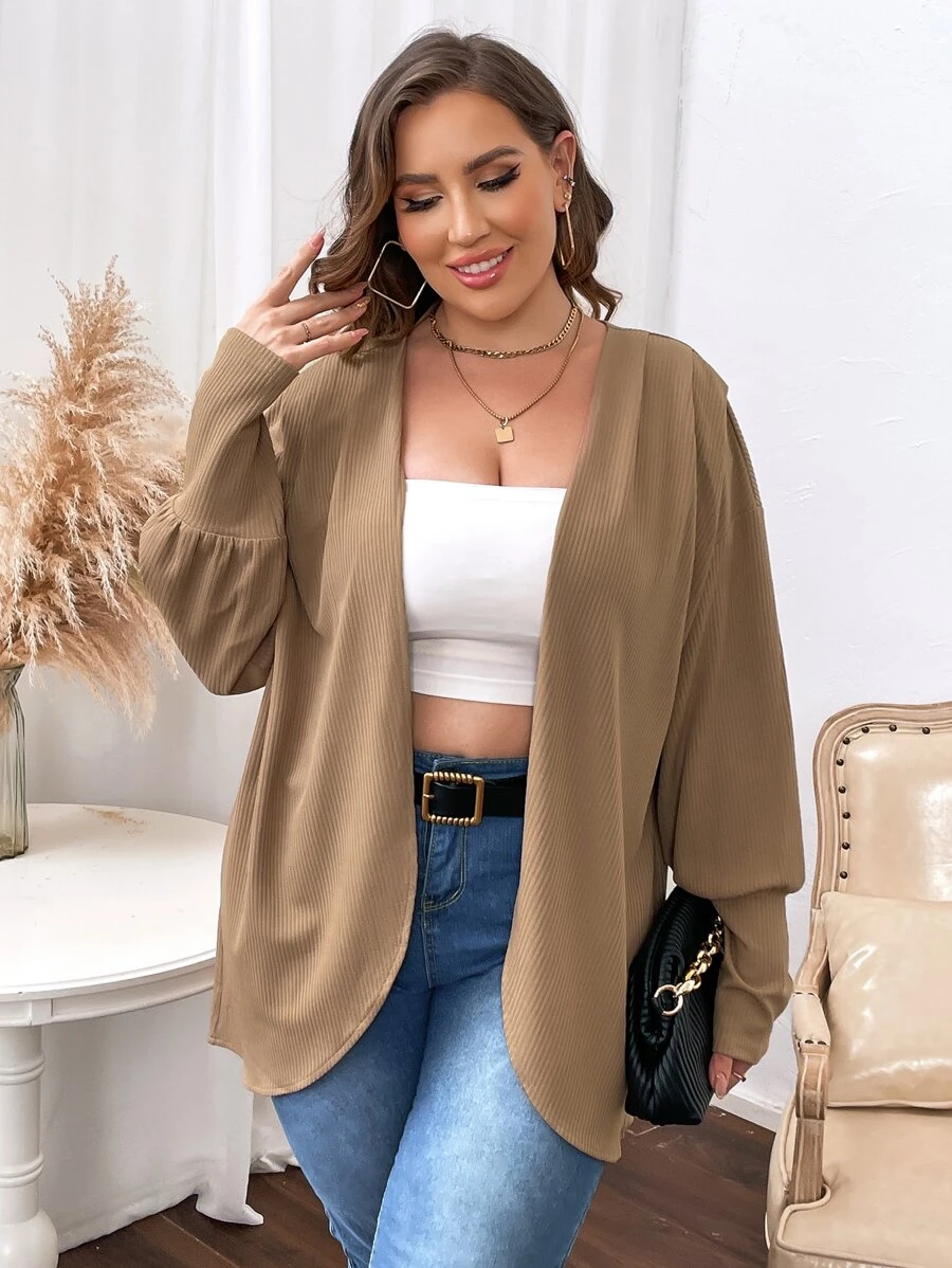 Manteau manches bouffantes ouvert