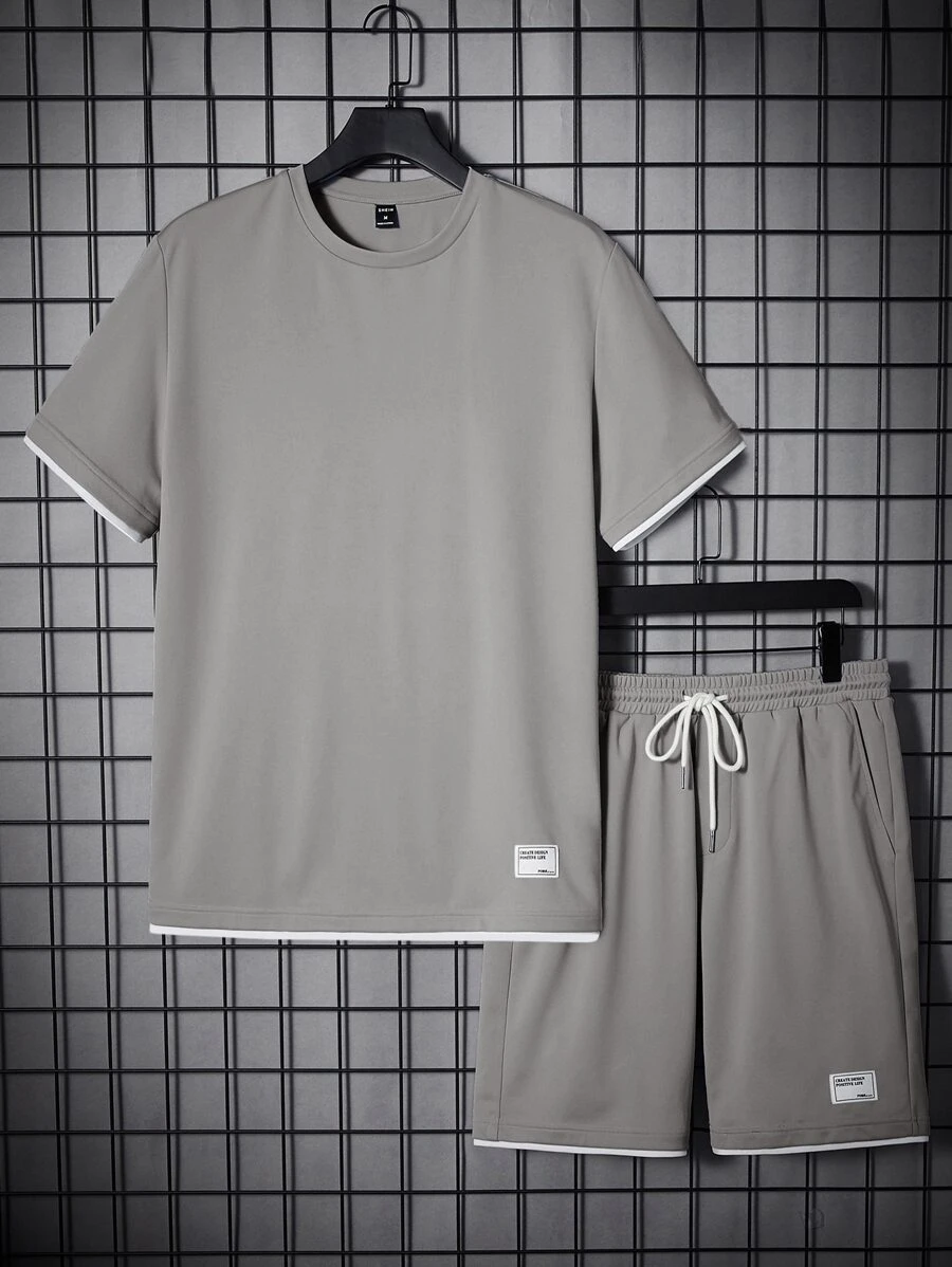 Manfinity VCAY Outfit estivo da uomo con t-shirt dettagli a contrasto e patch a lettera, pantaloncini con coulisse in vita