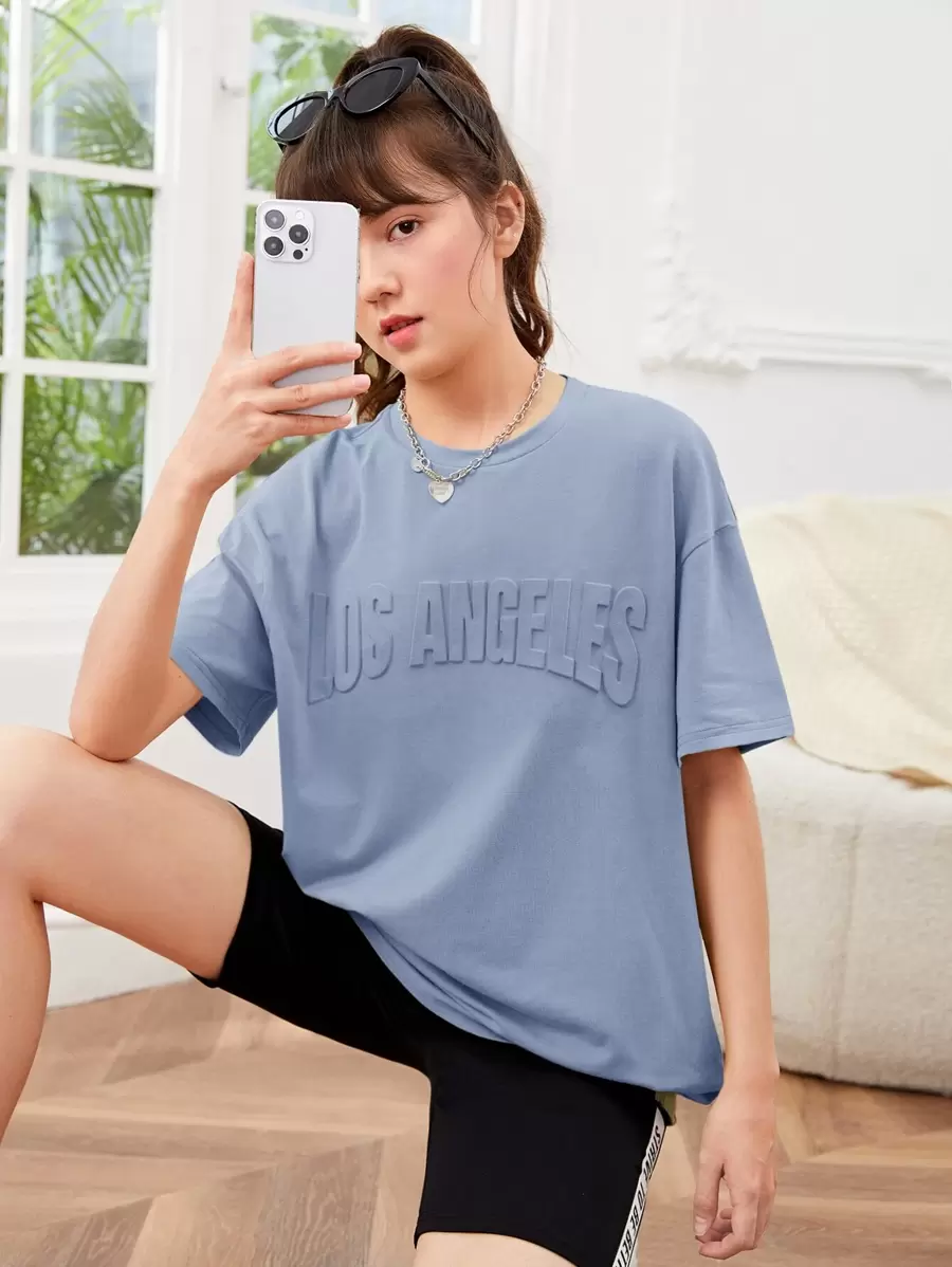 SHEIN Solid Color Loose Round Neck Teen Girls' Letter Print Dropped Shoulder T-Shirt