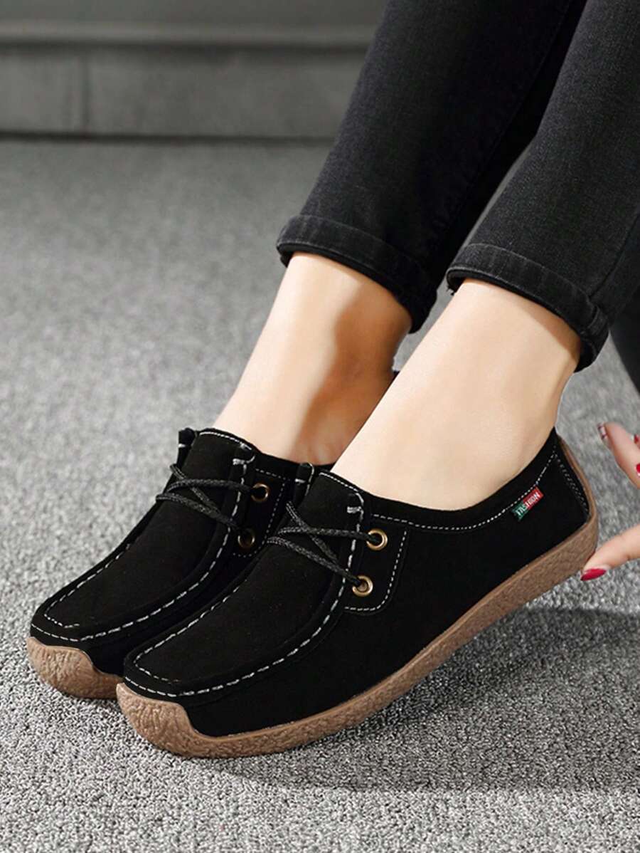 Zapatillas planas con cordón delantero