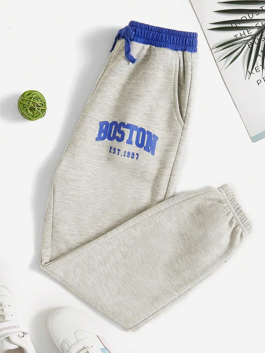 SHEIN Jogginghose für Tween Mädchen mit Schriftzug, Farbblock, Kordelzug in der Taille und gekräuseltem Saum mit schrägen Taschen