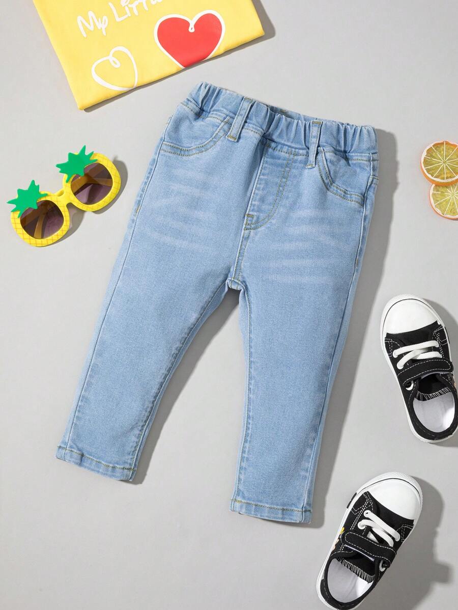 Bimba Jeans con vita elastica baffo di gatto lavato