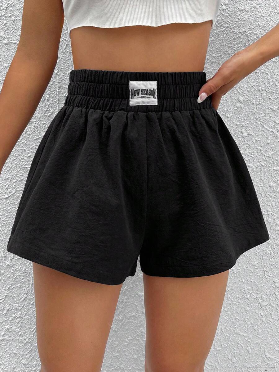 SHEIN EZwear Shorts de pierna ancha con diseño de parche de letra