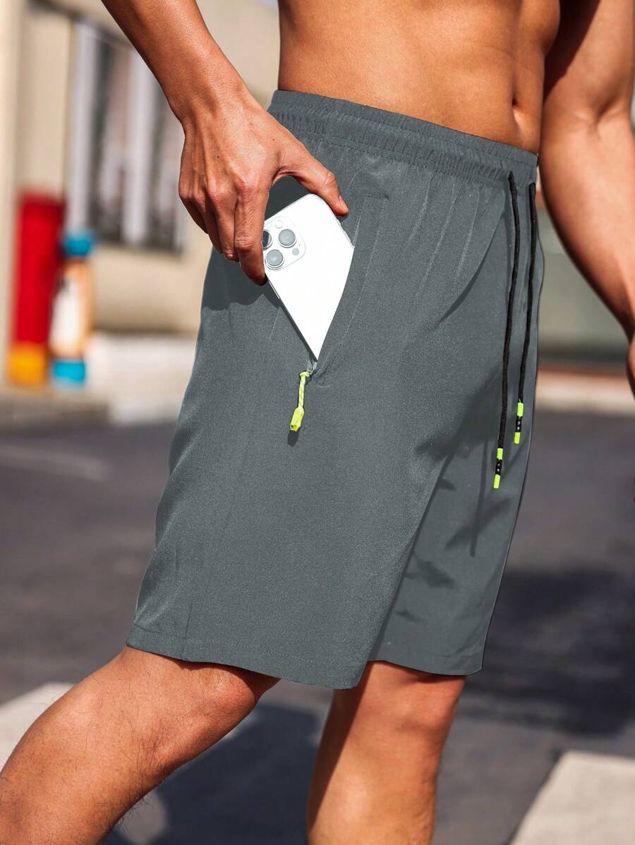 Manfinity Sport Corelite Pantaloncini casual da uomo stile boyfriend con coulisse in vita, tasche con cerniera, pantaloncini da allenamento, pantaloncini grigi da palestra
