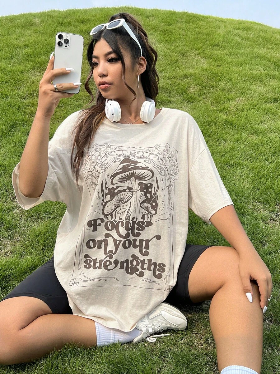 SHEIN EZwear Camiseta de manga caída con texto gráfico de lema talla grande, enfócate en tus fortalezas para el verano
