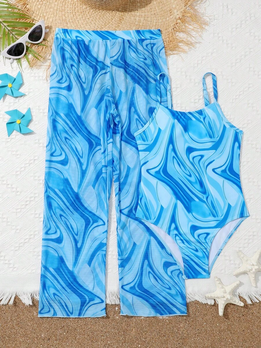 Chica preadolescente Bañador una pieza fluido con estampado con pantalones cover up