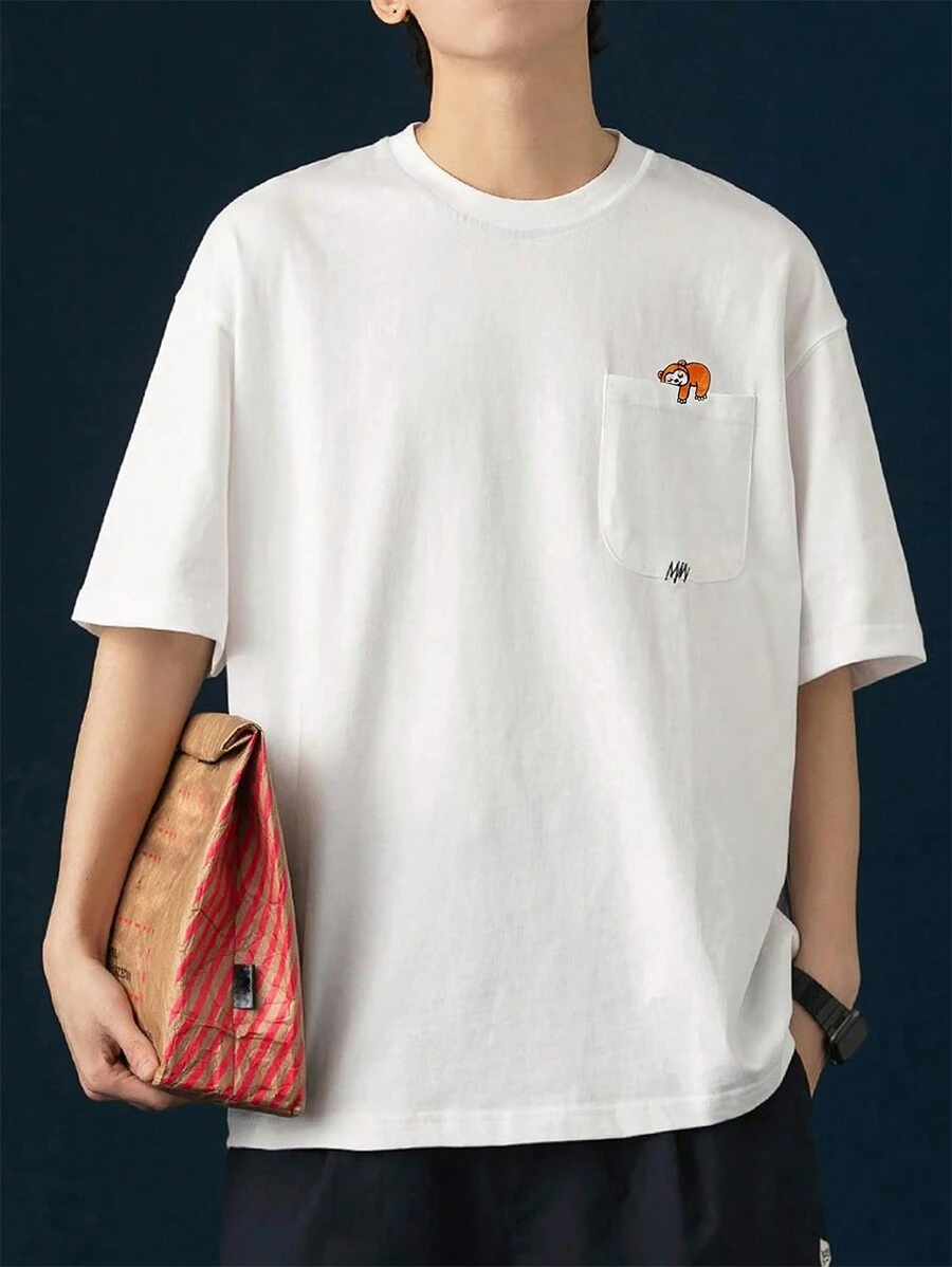 Manfinity Hypemode Camiseta holgada para hombre con bordado de dibujos animados y escote caído