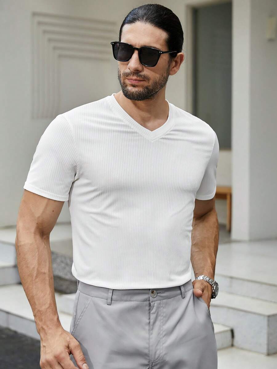 Manfinity Homme Uomo Maglietta monocolore con scollo a V