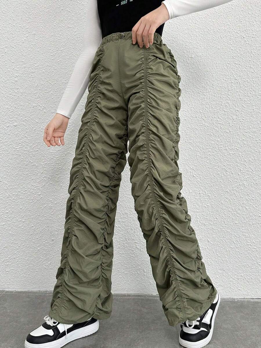 Pantalones anchos plisados con cordón y hebilla en forma de nariz de cerdo en unicolor tejido para adolescente