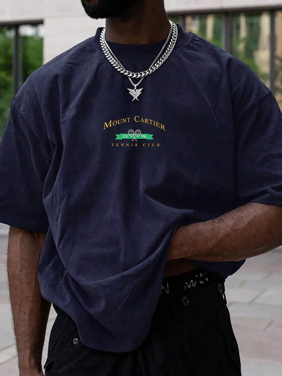 Manfinity Homme Camiseta de hombre de cuello redondo con gráfico de letras con corte holgado