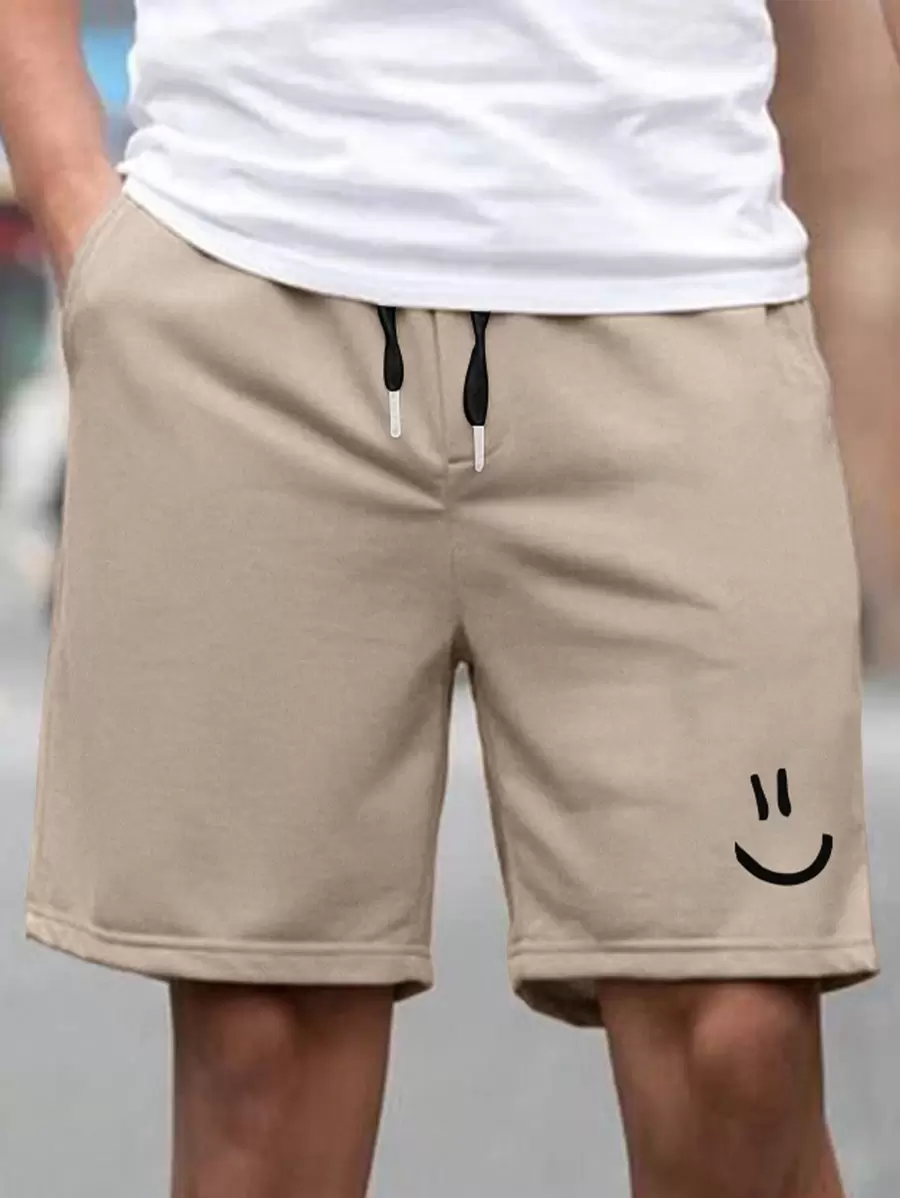 Manfinity Homme Pantaloncini larghi da uomo con grafica a fumetti e vita con coulisse