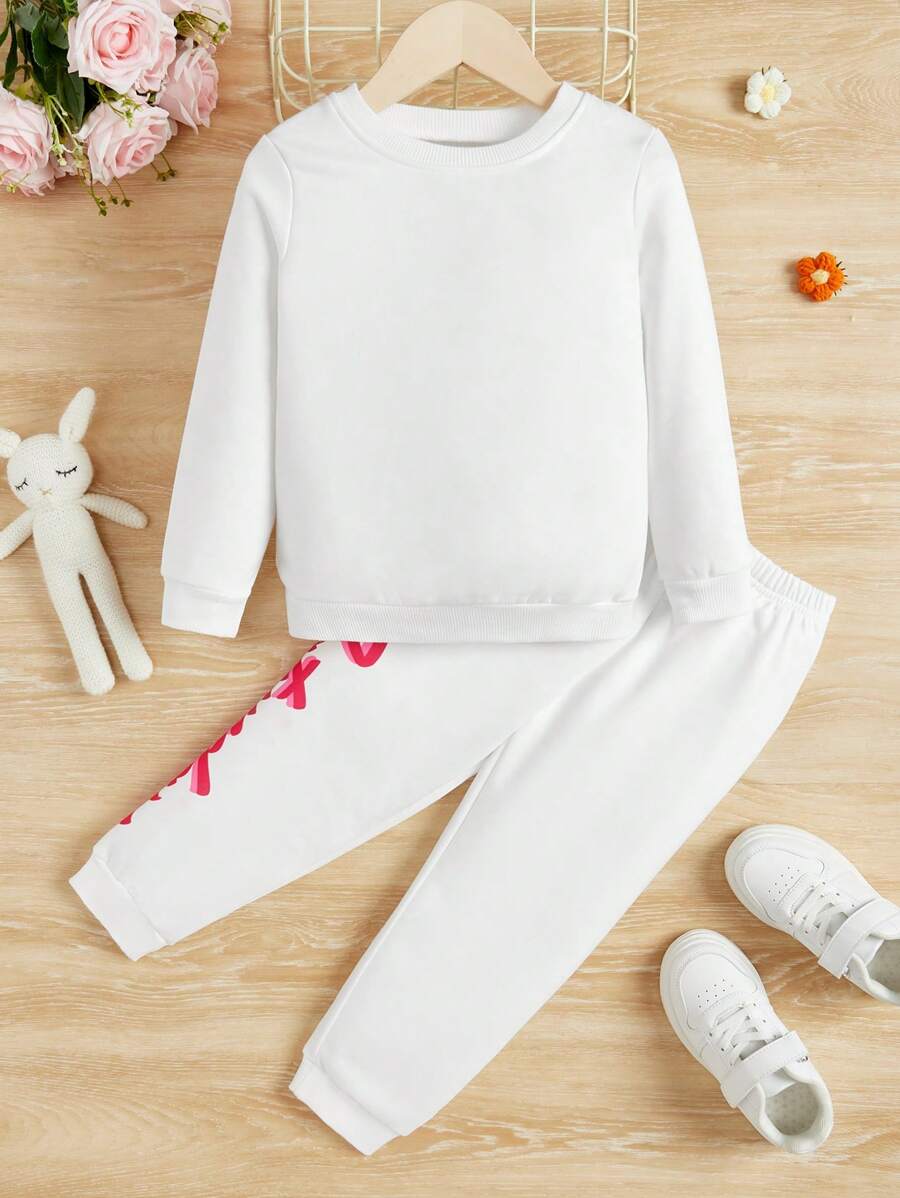 SHEIN Niñas Sudadera Unicolor Con Pantalones Deportivos Con Estampado De Corazones