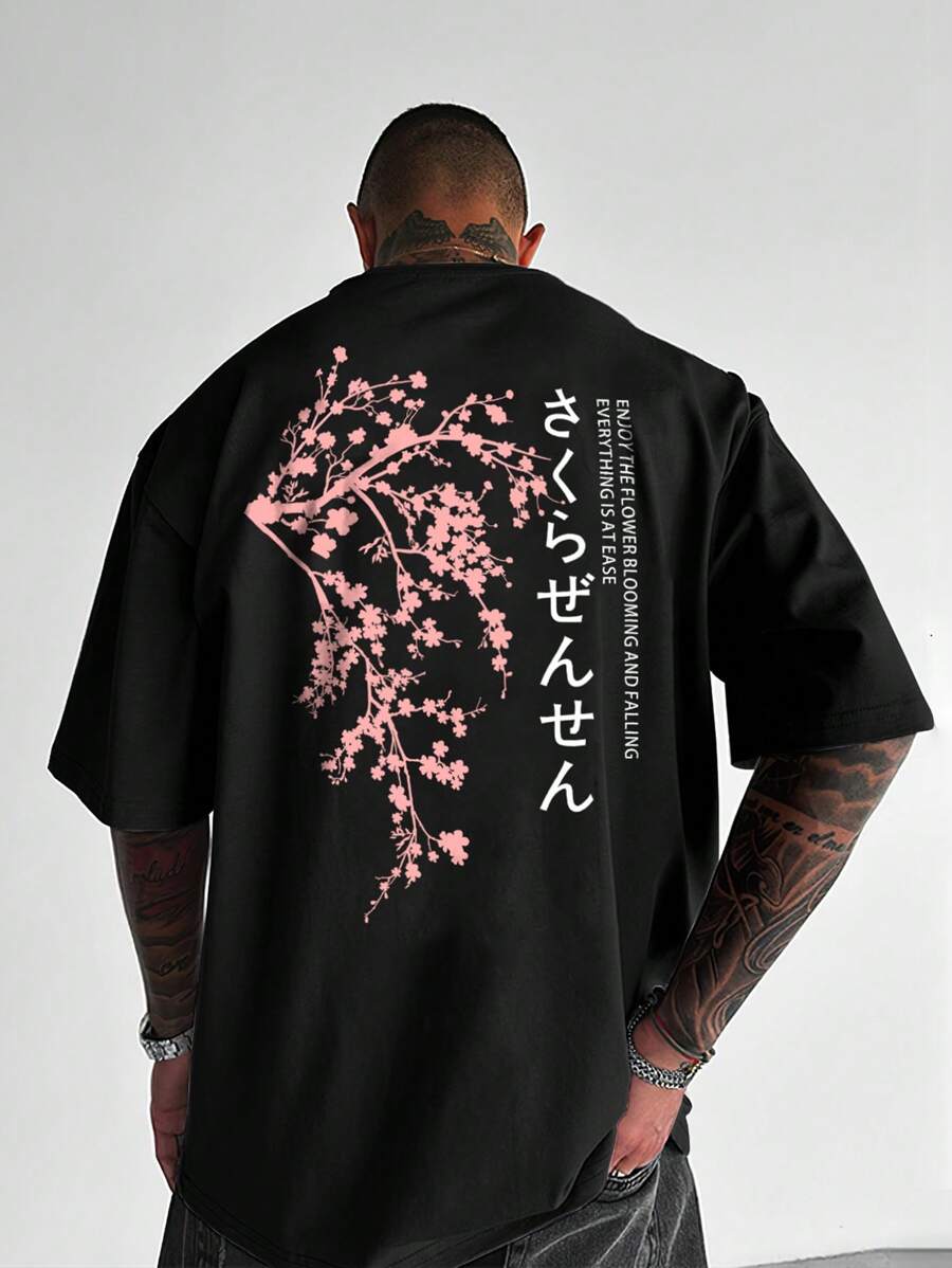 Manfinity Homme Camiseta de manga corta casual de talla grande para hombre con estampado floral y eslogan, para salir