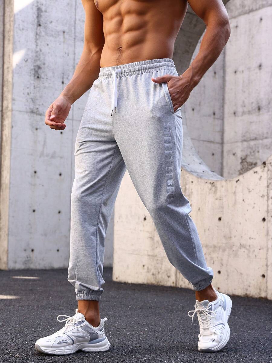 Manfinity Sport Streetwear Męski Spodnie sportowe Ze sznurkiem do ściągania Talia I Przekątna Kieszenie