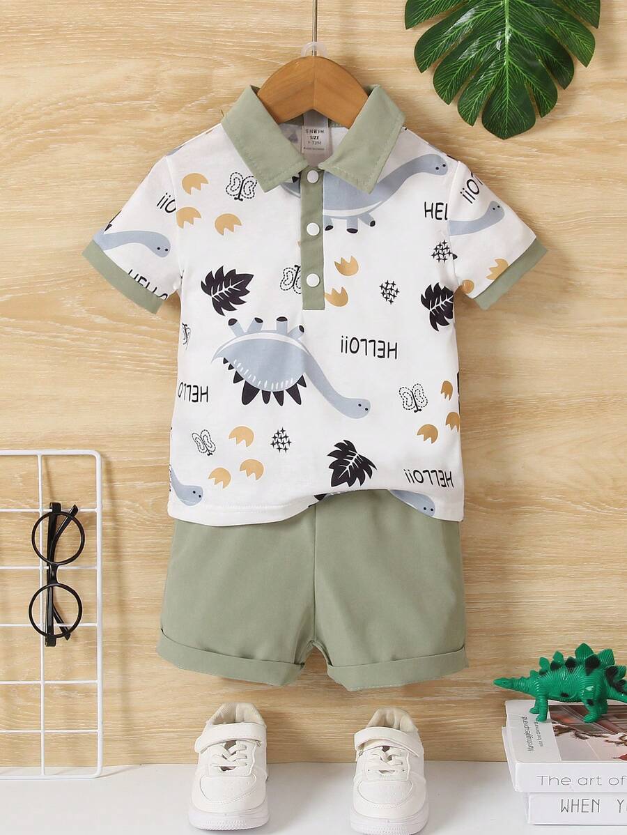 Polo A Righe Con Stampa Di Dinosauro E Pantaloni Corti Per Bimbi Alla Moda, Adatti Ai Mesi Estivi