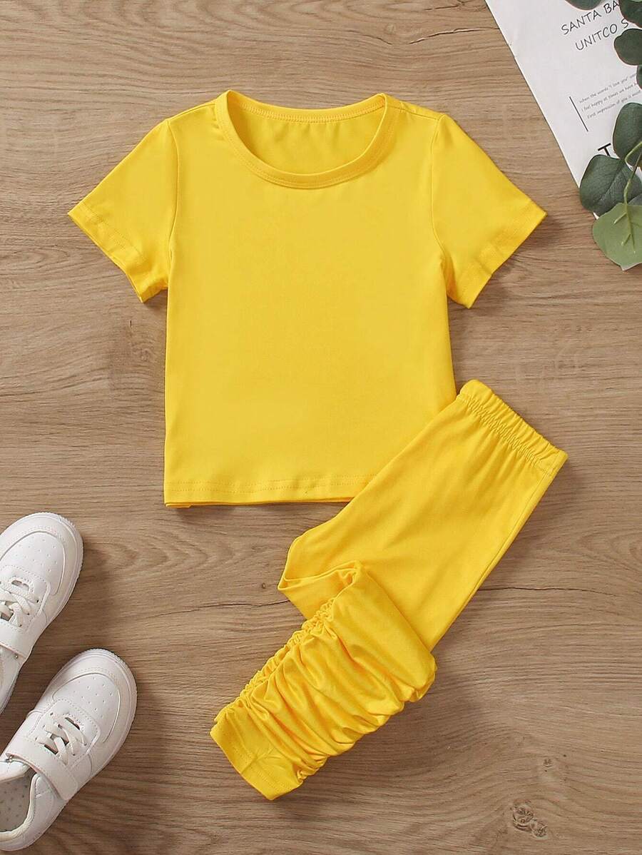 SHEIN Conjunto de 2 piezas para joven chica con camiseta de manga corta en color sólido y leggings plisados