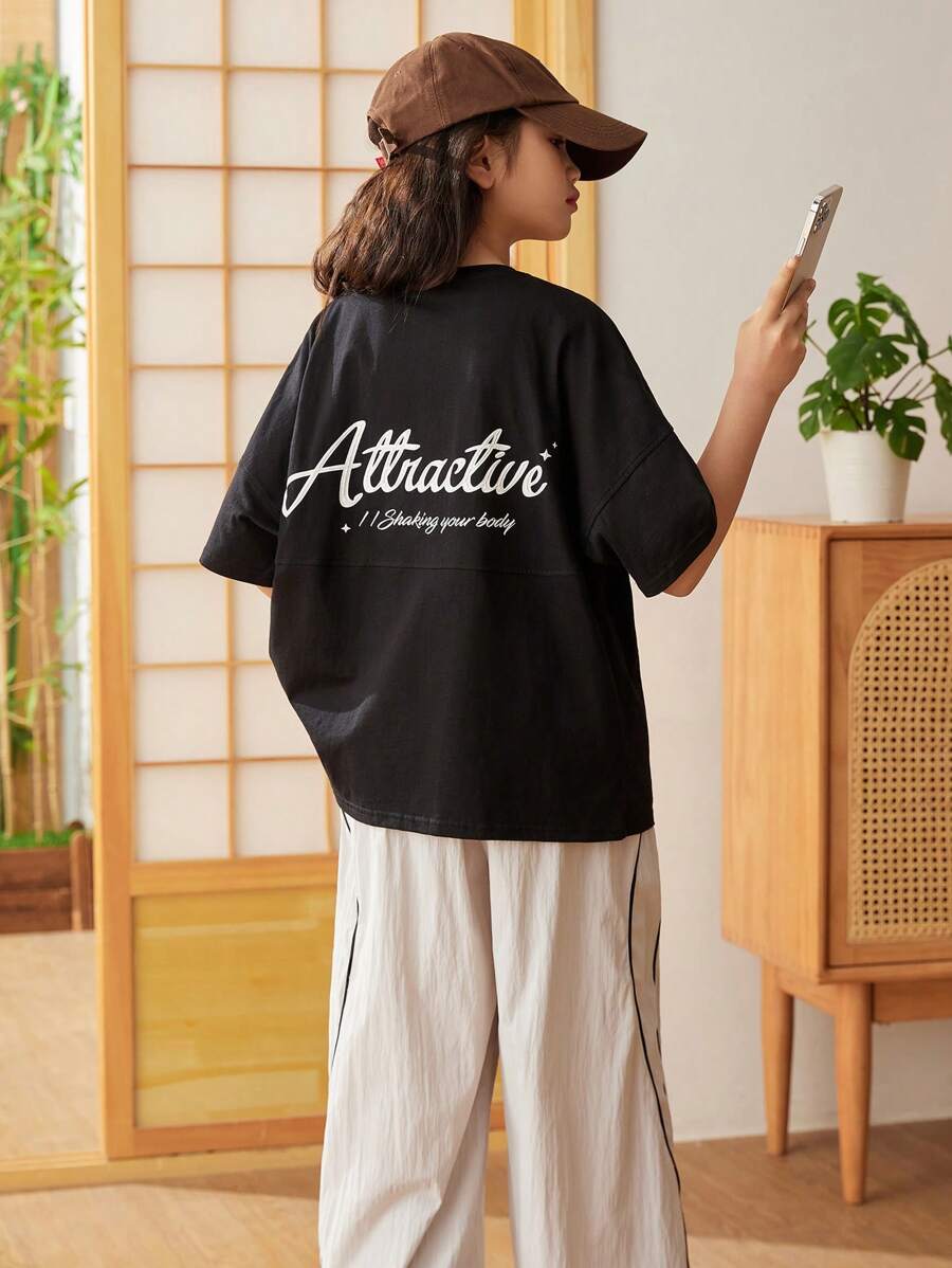 SHEIN Oversized Komfortables Rundhals-T-Shirt mit Drop Shoulder und geteiltem Design mit Buchstaben-Muster für Tween Mädchen