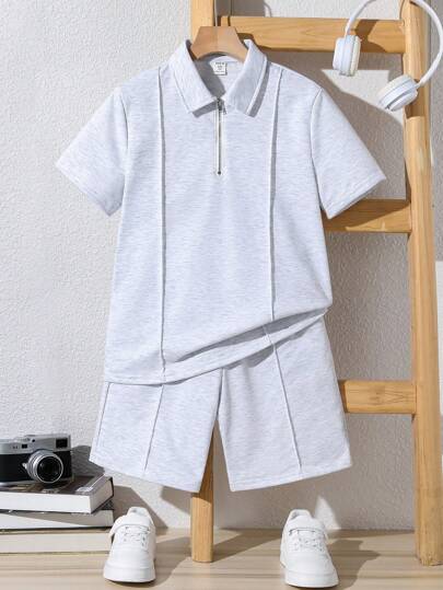 SHEIN Tween Boys' Loose Fit Casual Knitted Solid Color Short Sleeve Polo Shirt And Shorts 2pcs/Set