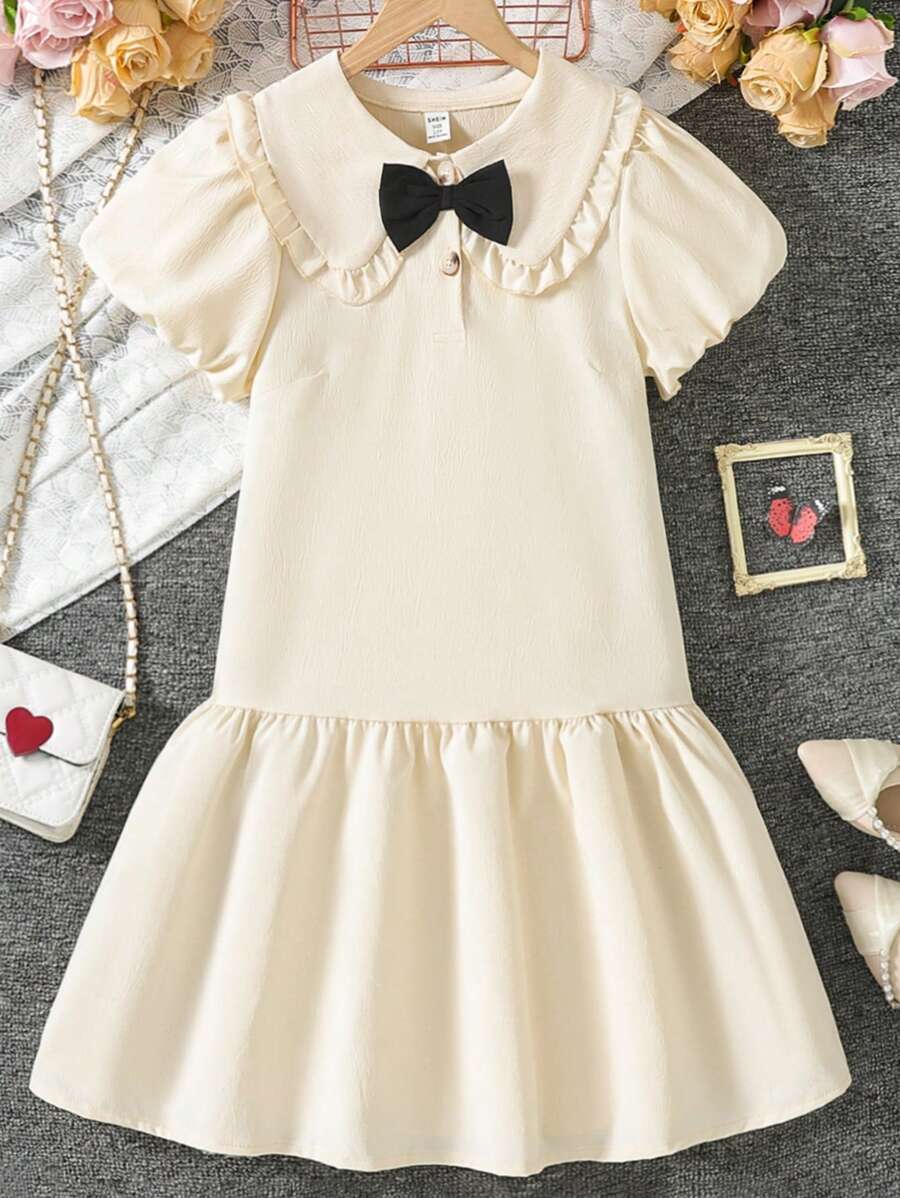 Vestido juvenil de primavera/verano con cuello de Peter Pan, informal y lindo con tela texturizada y diseño de lazo en la cintura