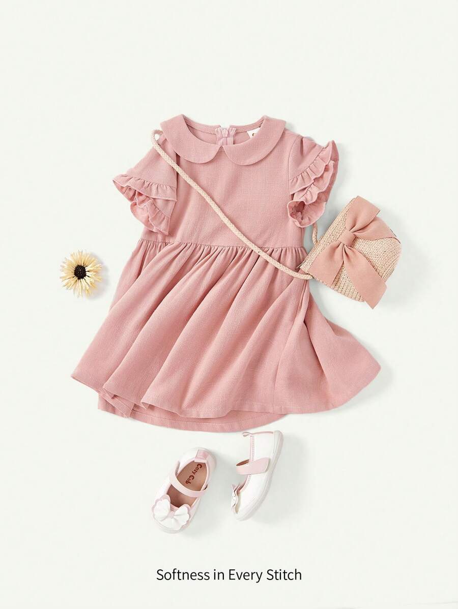 Cozy Pixies Vestido informal de niña bebé de unicolor con cuello Peter Pan, volantes y lazo en la cintura