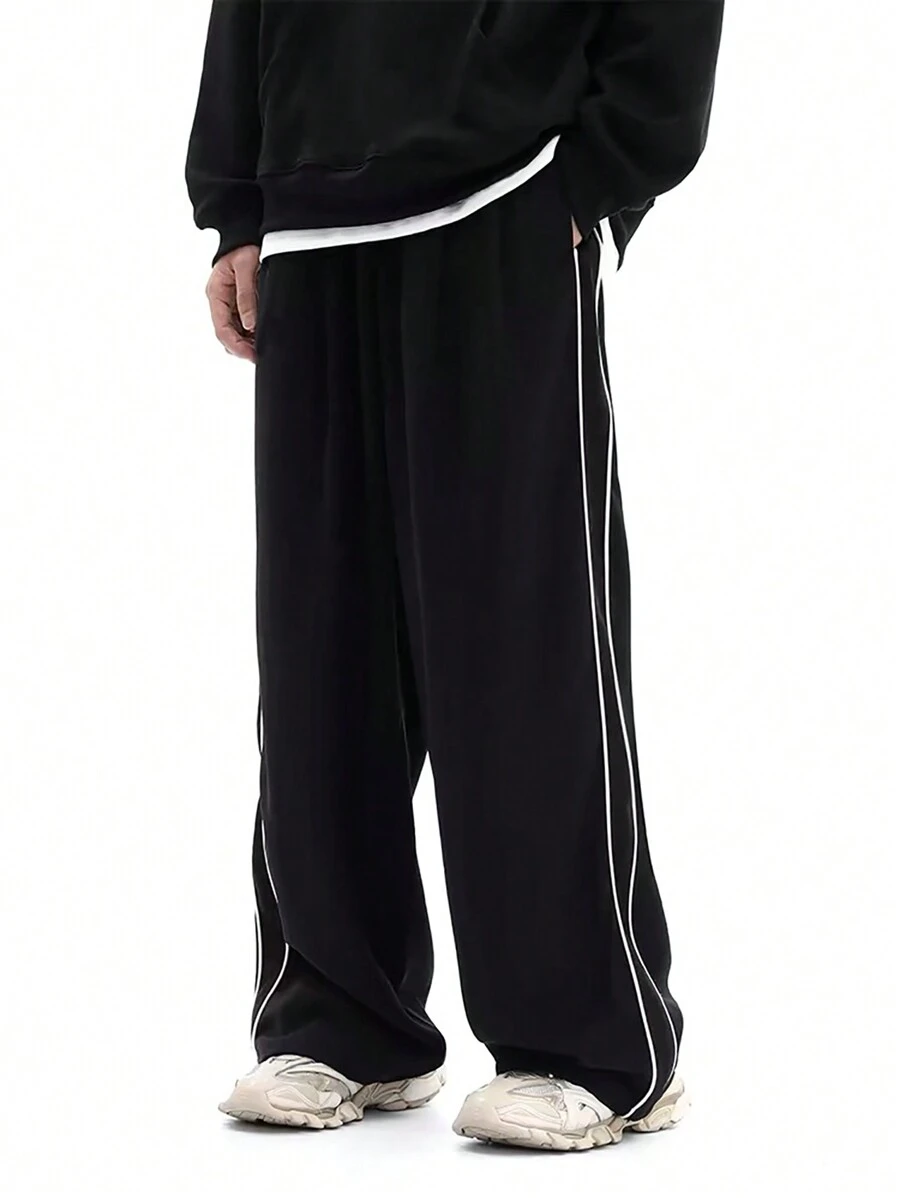 Manfinity Dauomo Pantalon large et ample pour hommes, basique décontracté avec poches latérales et design patchwork