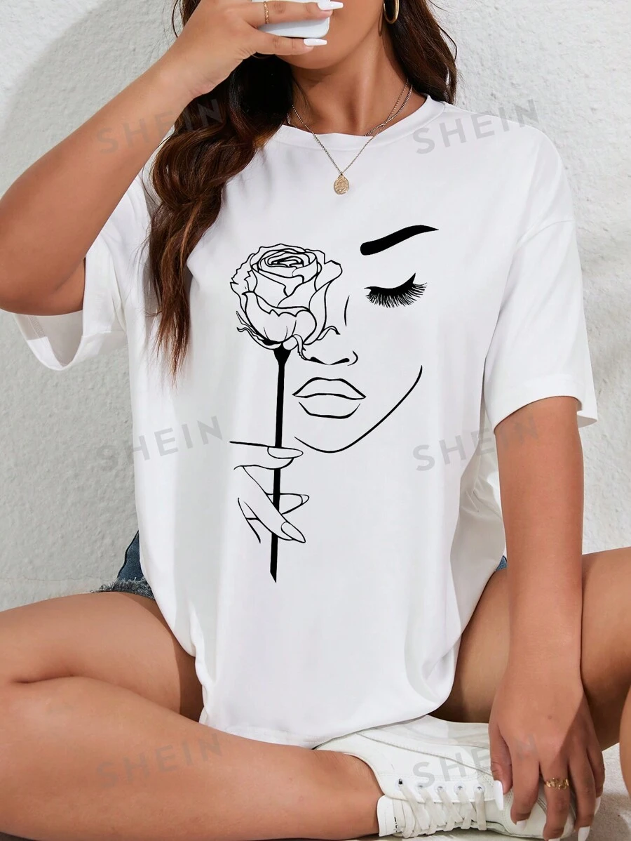 INAWLY Camiseta casual de manga corta con estampado de rostro abstracto y flor de cuello redondo para verano, camiseta gráfica tallas grandes para mujer