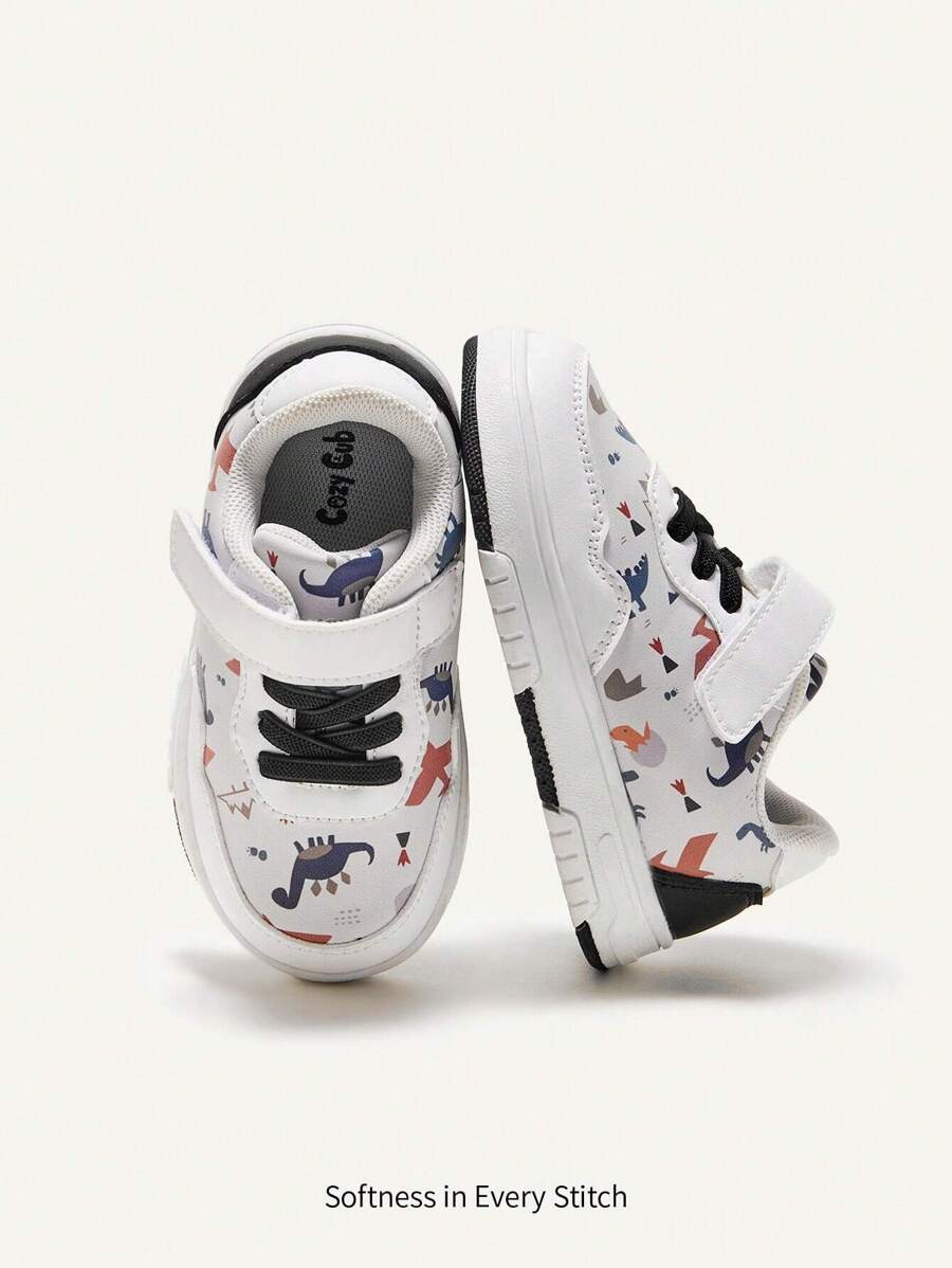 Cozy Pixies Boys' Casual, Fashionable, & Cute Dinosaur Printed Canvas Shoes With Cartoon Style, Anti-Collision Toe Design, Adjustable Hook And Loop And Waterproof Properties