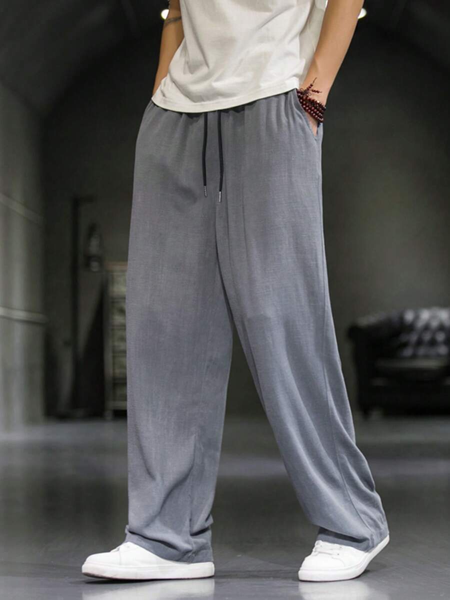 Manfinity Hypemode Losse heren effen kleur trekkoord taille broek met rechte pijpen