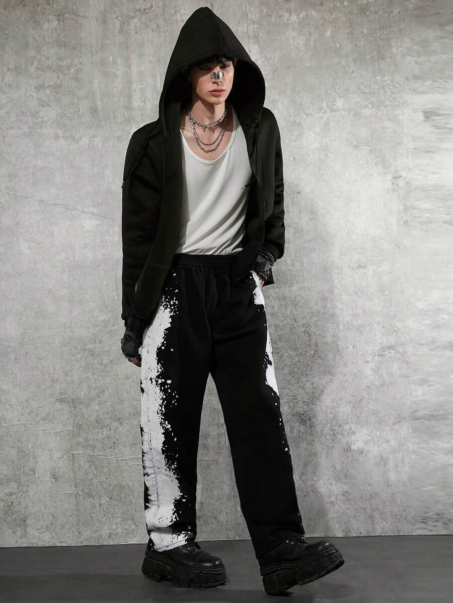 Manfinity Denimwave Men's Personalised Black Denim Pants, Wide Leg Cut, Unique Ink Splatter Print, Y2K Streatwear Fashion, Crafted For Street Style Aficionados Seeking Bold And Artistic Looks.