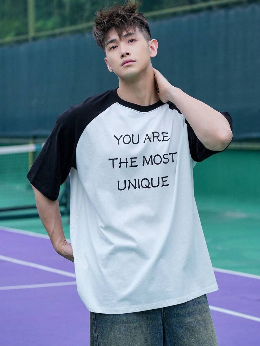 DAZY T-shirt casual à manches courtes pour hommes avec imprimé slogan en bloc de couleurs, manches raglan. Tee-shirts graphiques