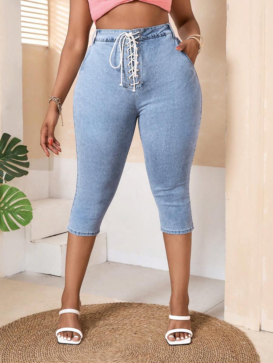 SHEIN SXY Jeans 3/4 ajustados de talle alto para mujeres de talla grande con banda elástica y teñido en azul