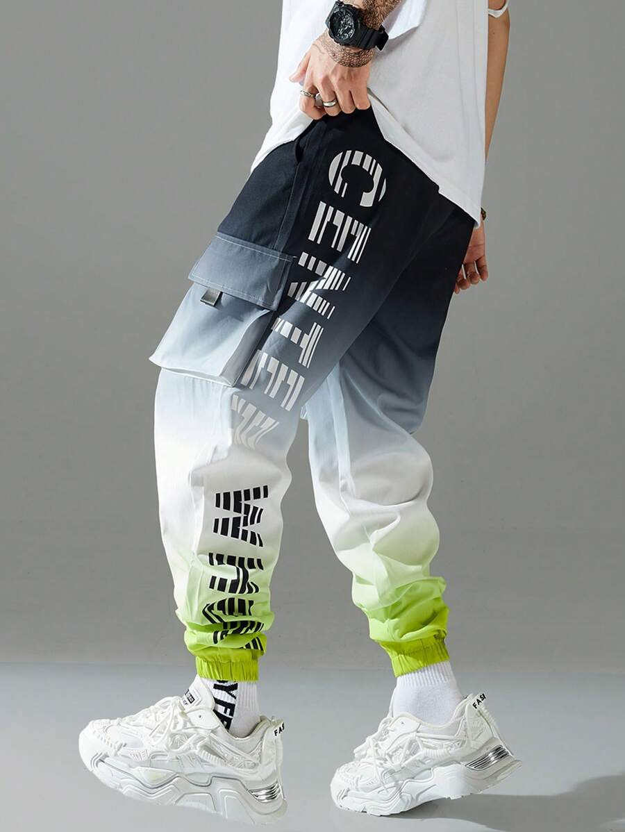 Manfinity EMRG Pantalon de jogging cargo pour homme avec impression de lettres et poches, ample et long, coloris bleu foncé à la mode pour sortir