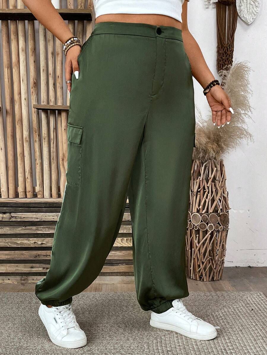 Plus Size Solid Color Drawstring Waist Casual Tapered Pants With Pockets