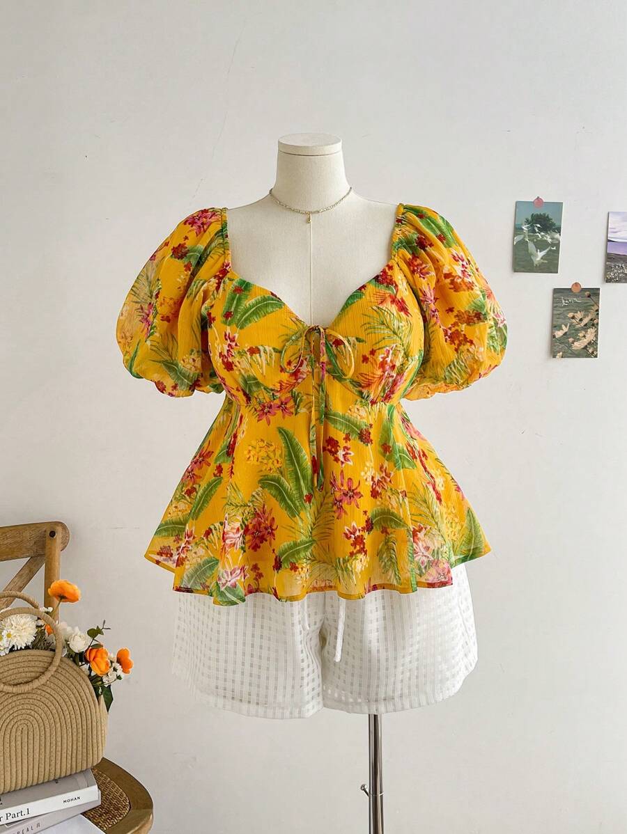 Soleia Blusa con cuello en forma de corazón y lazo en la parte delantera para mujer de talla grande con mangas abullonadas. Blusa casual de verano para vacaciones en la playa con estampado tropical de flores.