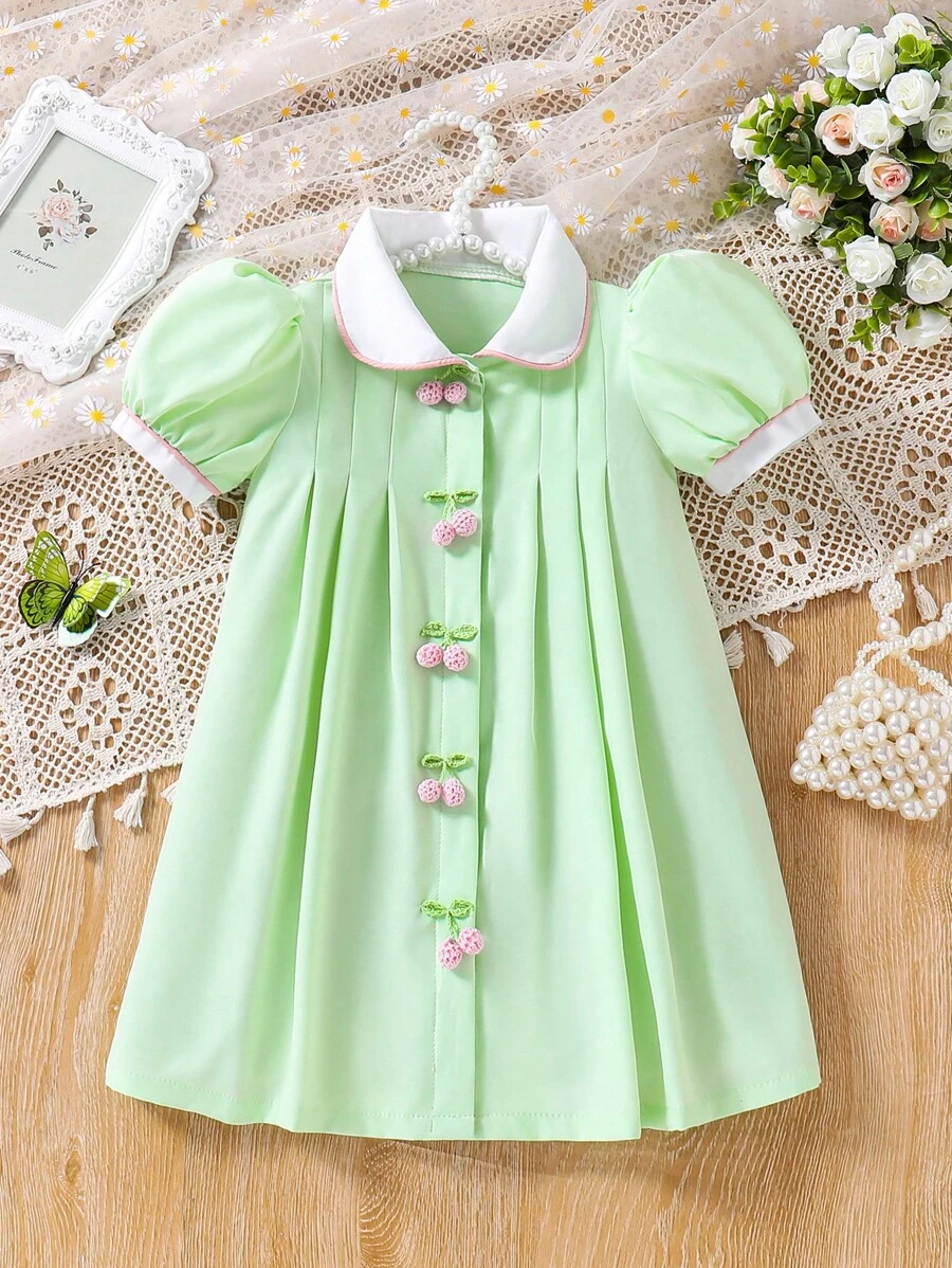 SHEIN Kleine Mädchen Landurlaub gewebtes Farbblock-Kleid mit gerafftem Peter Pan Kragen, Puffärmel, Falten und Kirschen Schmuck, Frühling/Sommer