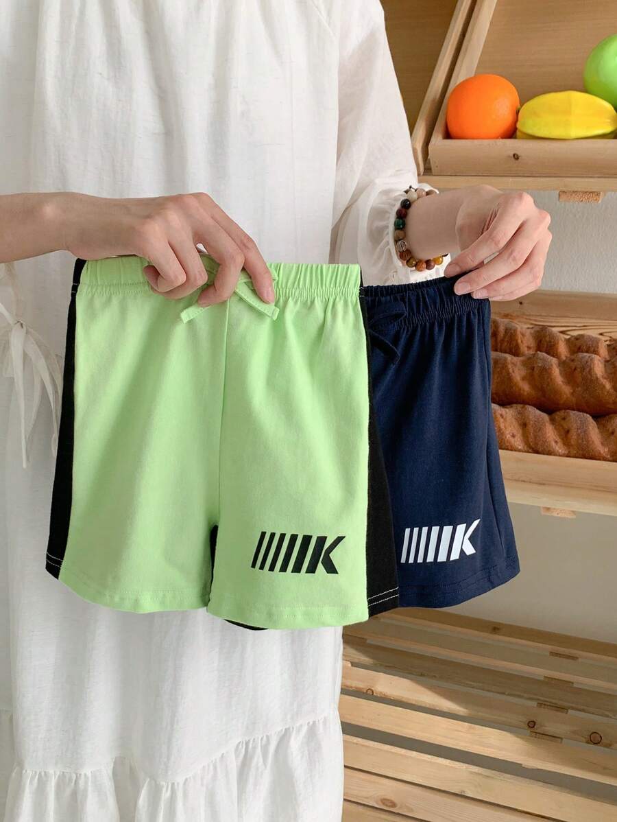 2pcs/Set Baby Boys' Spring/Summer Comfortable Sporty Casual Bottoms, Featuring Fluorescent Green & Navy Blue Patchwork Design