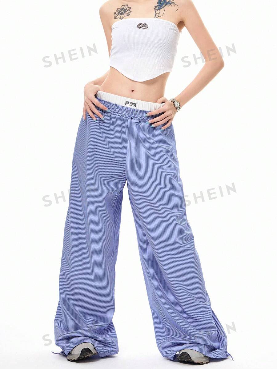 SHEIN EZwear Pantalones largos casuales de mujer con estampado de fútbol, bloque de color y cordón en la cintura