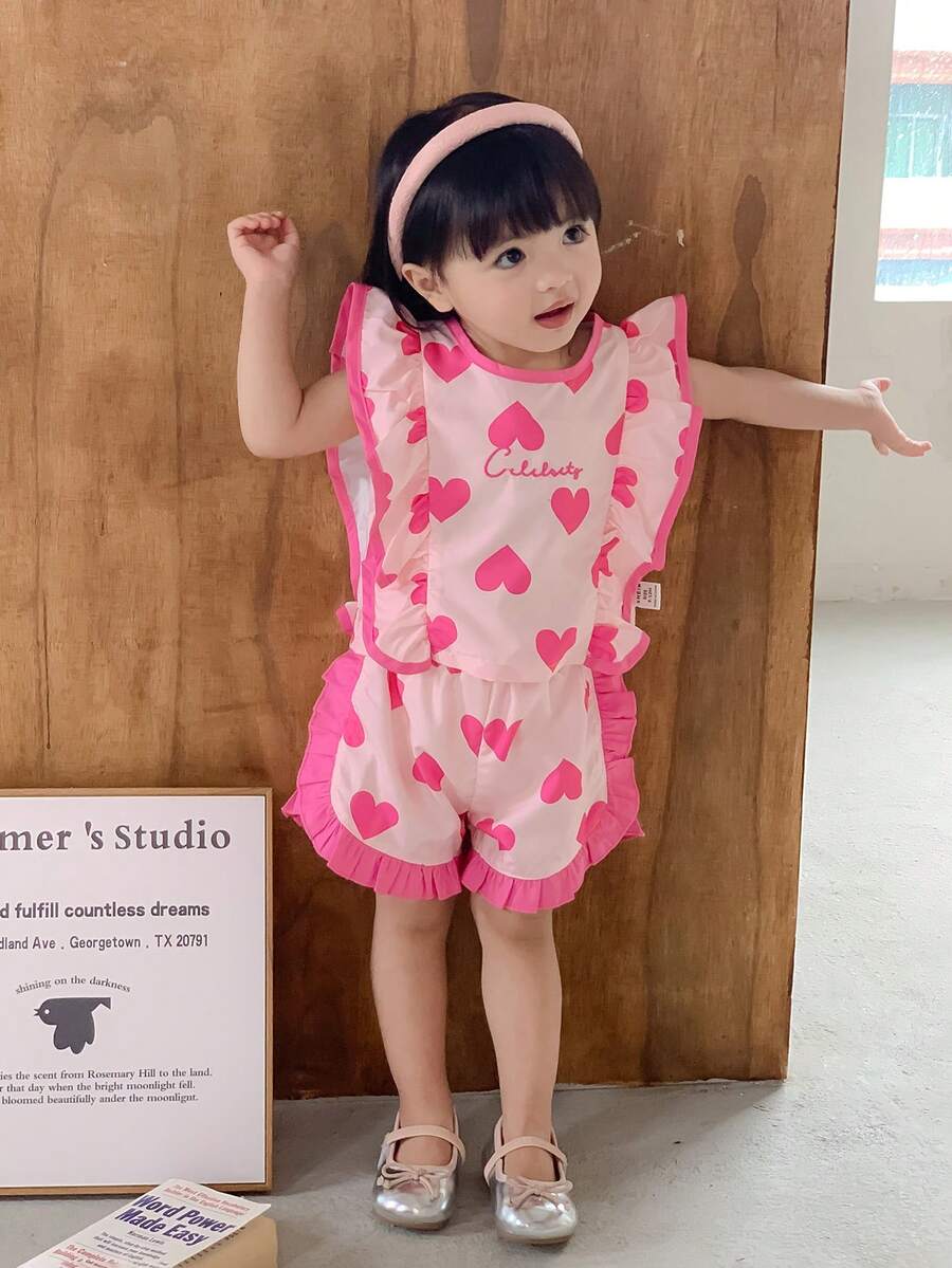 SHEIN 2 pezzi Set di top e pantaloncini con orlo a volant carino e cuore ricamato per bambine in età prescolare, abbigliamento primavera/estate