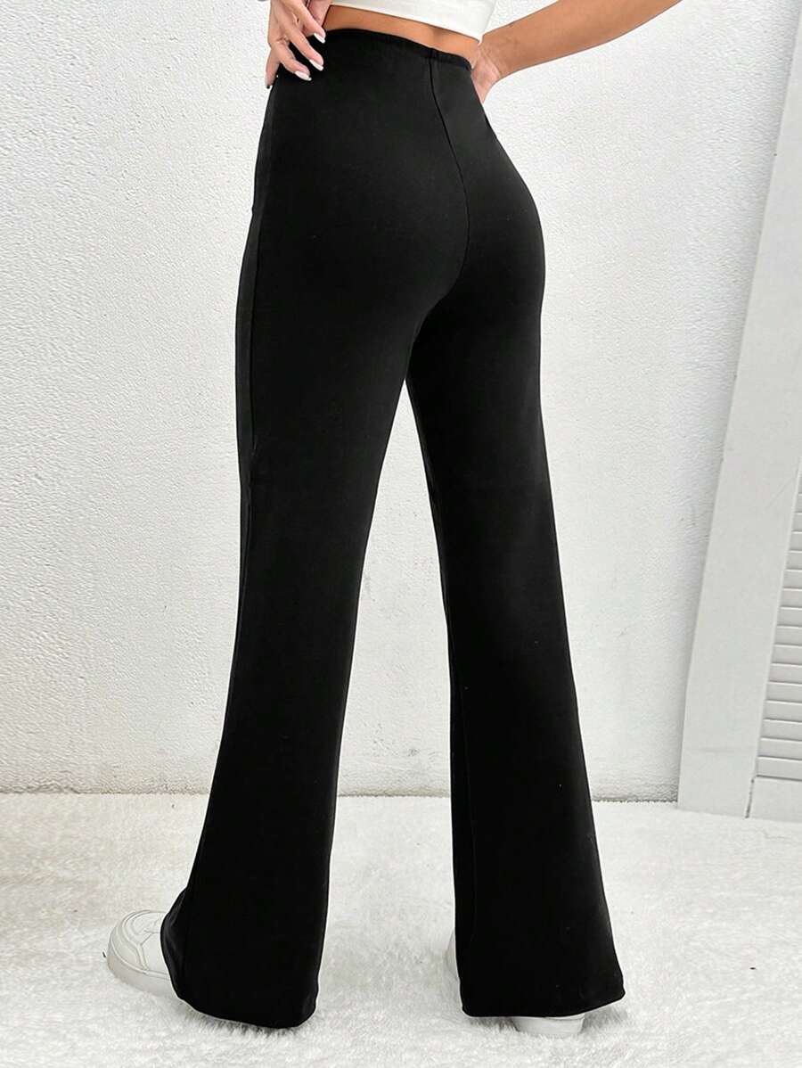 SHEIN PETITE Pantalon confortable noir à grande élasticité et évasé