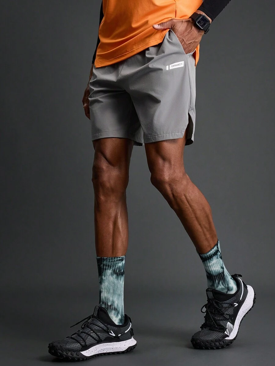 Manfinity Sport Polished Freund Stil Herren Lässig Sport Shorts mit Buchstaben-Muster Taschen, graue Shorts
