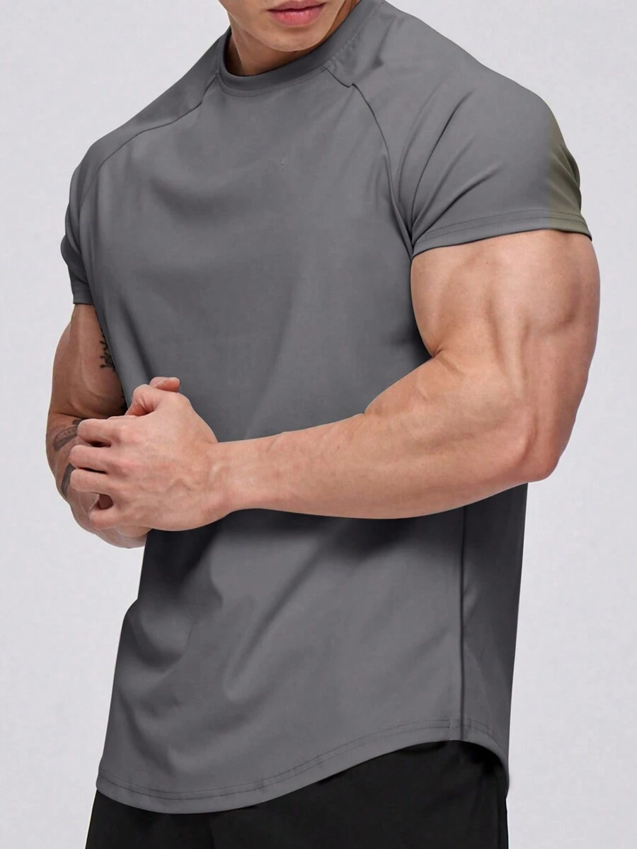 Manfinity Fitness Camiseta deportiva de manga corta para hombres - entrenamiento y gimnasio y ejercicio, casual de compresión que absorbe la humedad y se seca rápido, ajuste regular en gris oscuro de cuello redondo con gran elasticidad - estilo de novio camiseta deportiva de verano de unicolor para hombres, camiseta de gimnasio transpirable