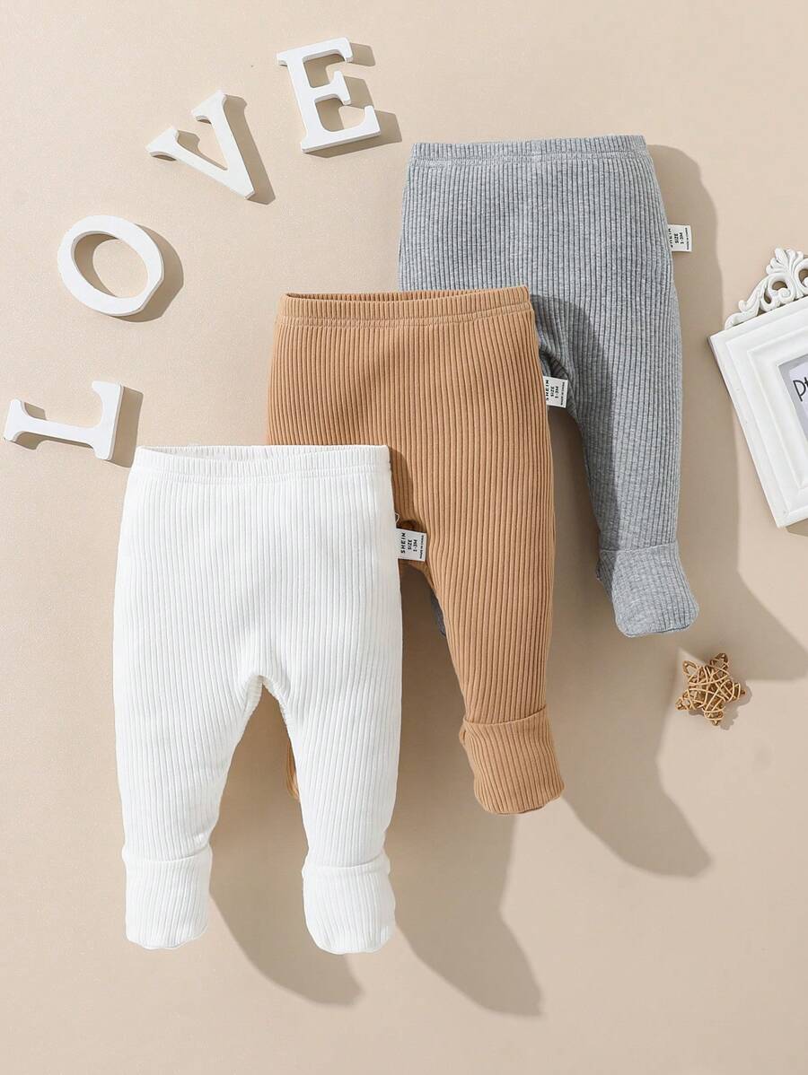 SHEIN Juego de 3 piezas de leggings de punto elásticos de unicolor a juego para bebé recién nacido niño/niña