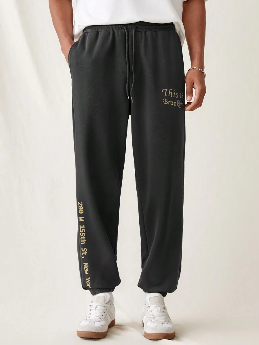 Manfinity VCAY Pantalones de punto sueltos para hombre con cinturilla elástica y puños acanalados, con patrón impreso en inglés de moda y para uso diario