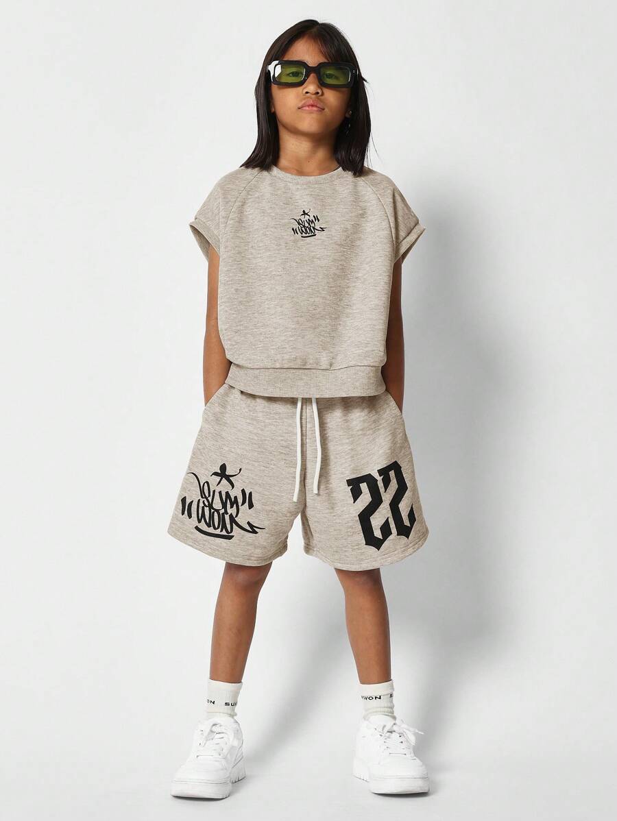 SUMWON Conjunto de 2 piezas con camiseta de manga corta y pantalón corto con estampado gráfico frontal para niñas preadolescentes