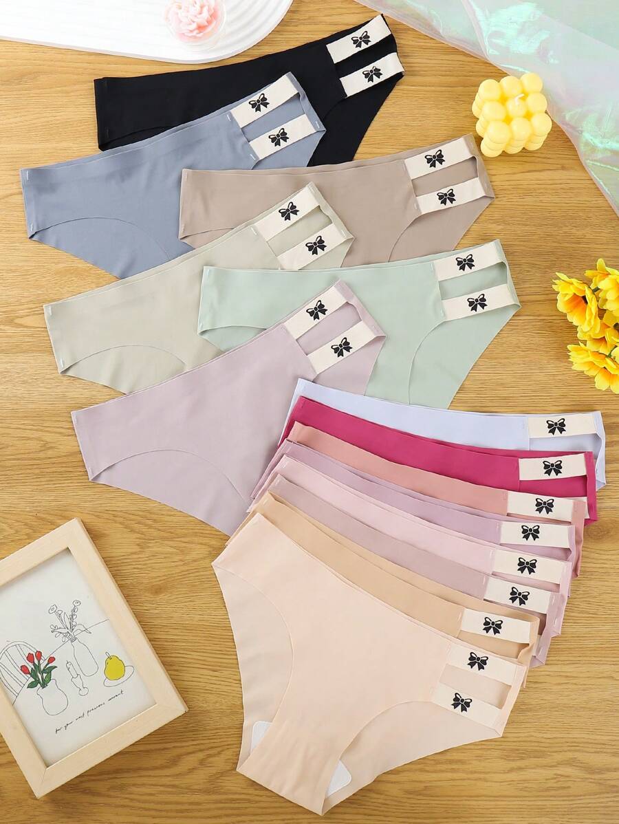 14 piezas/set Bragas triangulares sin costuras con lazo adorable para mujer